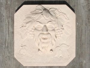 Tête de Bacchus bas-relief