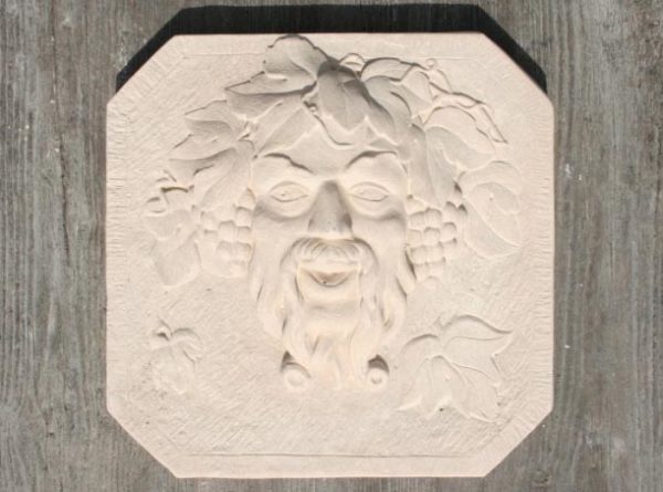 Tête de Bacchus bas-relief